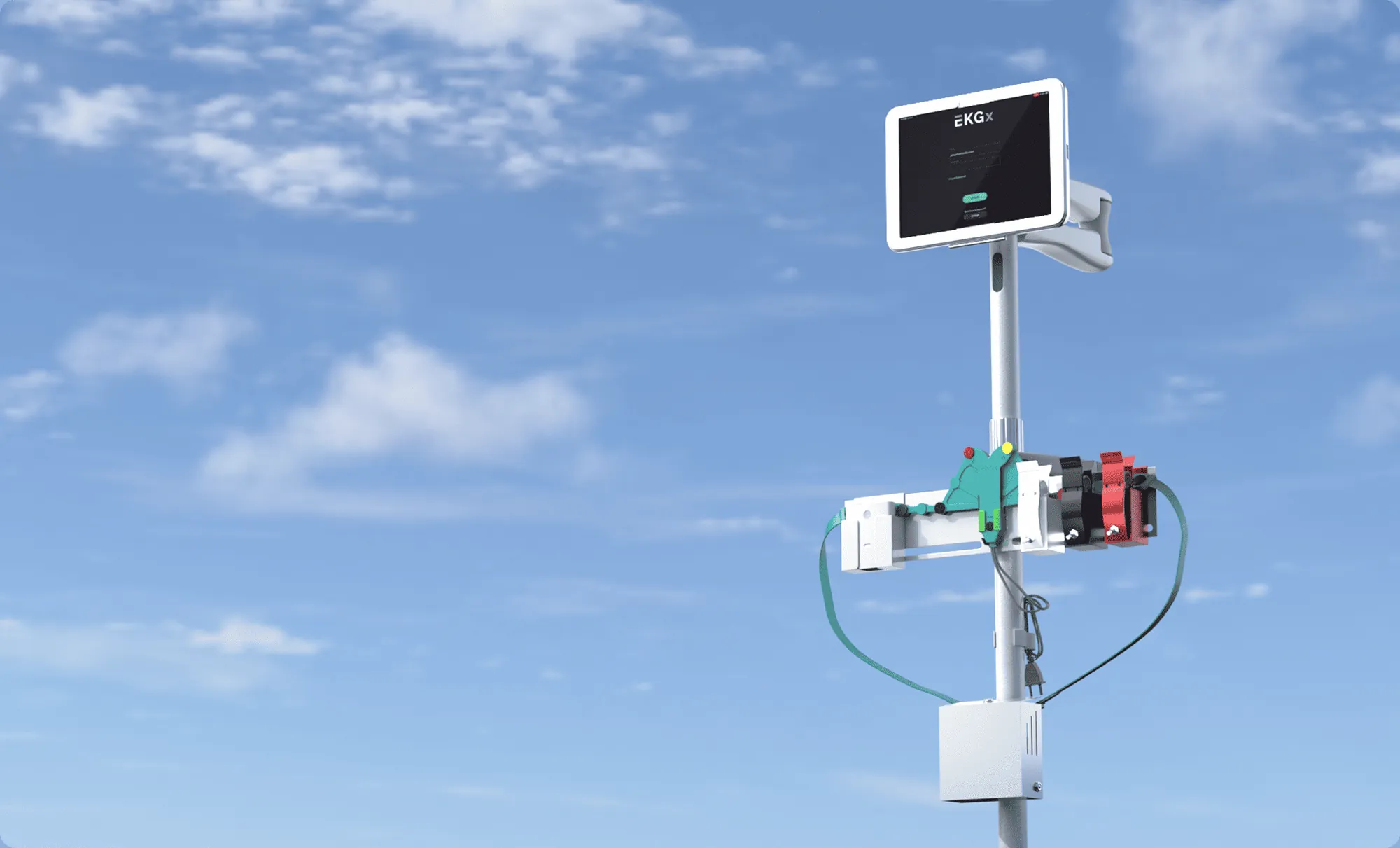 EKGx stand with tablet and adaptive 12-lead belt against a blue sky
